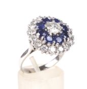 A modern sapphire and diamond flower-head cluster ring.