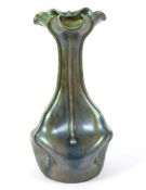 A Zsolnay Pecs Art Nouveau pottery iridescent green glazed vase.