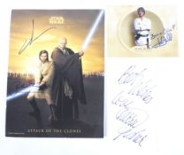 A collection of Star Wars autographs.