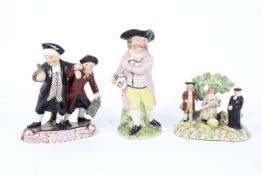 Three 19th century Staffordshire pottery figures.