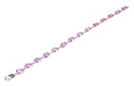 A pink sapphire line bracelet.