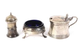 A silver salt, mustard pot and salt shaker (with liner). Various makers and hallmarks.