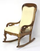 A 19th century Continental fruitwood rocking chair.