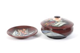 A Moorcroft Pottery Red Tulip circular dish and cover and a small circular dish.