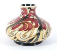 A Moorcroft Pottery squat globular vase. Printed, painted and impressed marks, Kerry Godwin, c.