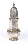 An octagonal shaped silver sugar sifter. With pierced decoration to the lid.