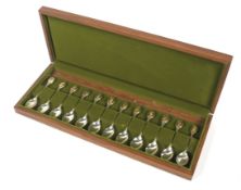 A wooden cased set of silver presentation Horticultural Society Flower Spoons.