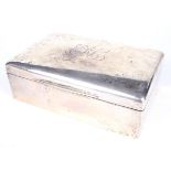 A late Victorian large silver desk top cigarette box.