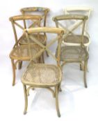 A matched set of five rattan seated wicker chairs.