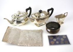 An assortment of silver plated wares and other items.