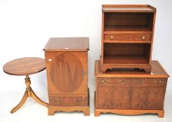 A burrwood veneer collection of furniture.