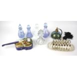 An assortment of glass bottles and other items.