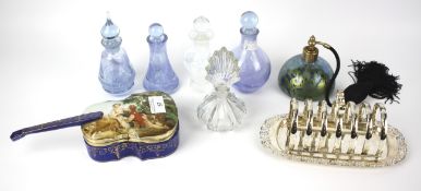 An assortment of glass bottles and other items.