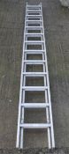 A modern two section aluminum ladder.