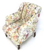 An Edwardian re-upholstered ladies elbow chair.