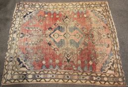 A 20th century woven rug.