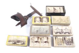 A collection of approximately 175 early stereoview photographs and a wooden extending stereoscopic