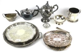An assortment of vintage and modern silver plated wares. Including coffee pot, assorted trays, etc.