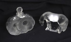 Two pieces of Lalique glassware. Comprising a scent bottle modelled as two flowers, H9.