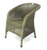 A Lloyd Loom green painted wicker tub chair.