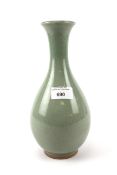 A contemporary celadon vase.