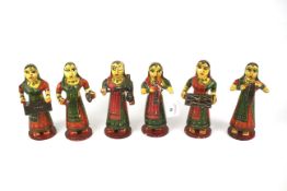 A set of six 20th century Indian painted wooden figures.