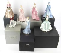 A collection of seven Royal Worcester and Royal Doulton figures of ladies.