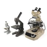 Three 20th century microscopes.