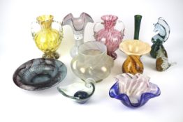 An assortment of art glassware.