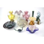 An assortment of art glassware.