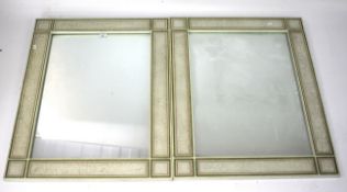 A pair of contemporary wall mirrors.