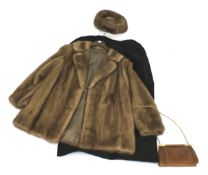 A mink fur coat, with matching hat and two bags.