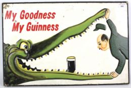 A novelty 'My goodness, my Guiness' painted wooden wall plaque. 60cm x 40.
