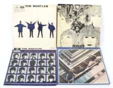 Four Beatles Albums.