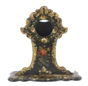 A Victorian papier mache pocket watch stand.