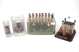 A collection of lead commemorative figures.