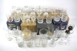 A large collection of cut glassware.