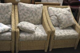 A six piece rattan conservatory suite.