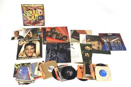 A quantity of assorted 45s and LPs.