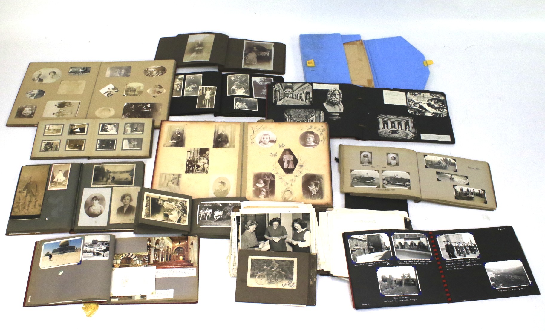 A quantity of early/mid 20th century photograph and postcard albums.