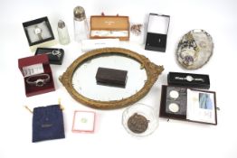 An assortment of collectables. Including costume jewellery, mirror, watches, etc.