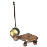 An early 19th century copper and brass mounted bed warming pan and other items of copper.