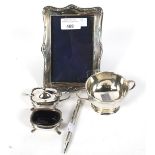 An assortment of 20th century and later silver and white metal.