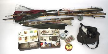 An assortment of vintage fishing rods, reels, tackle and related items.
