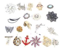 Twenty 20th century and later brooches.