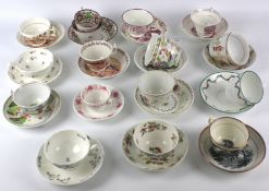 A group of 19th century English pottery and porcelain teabowls and saucers.
