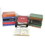 A collection of assorted stamp albums.