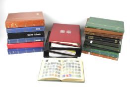 A collection of assorted stamp albums.