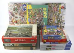 An assortment of jigsaw puzzles.