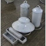 Assorted galvanized chicken feeders and related items.